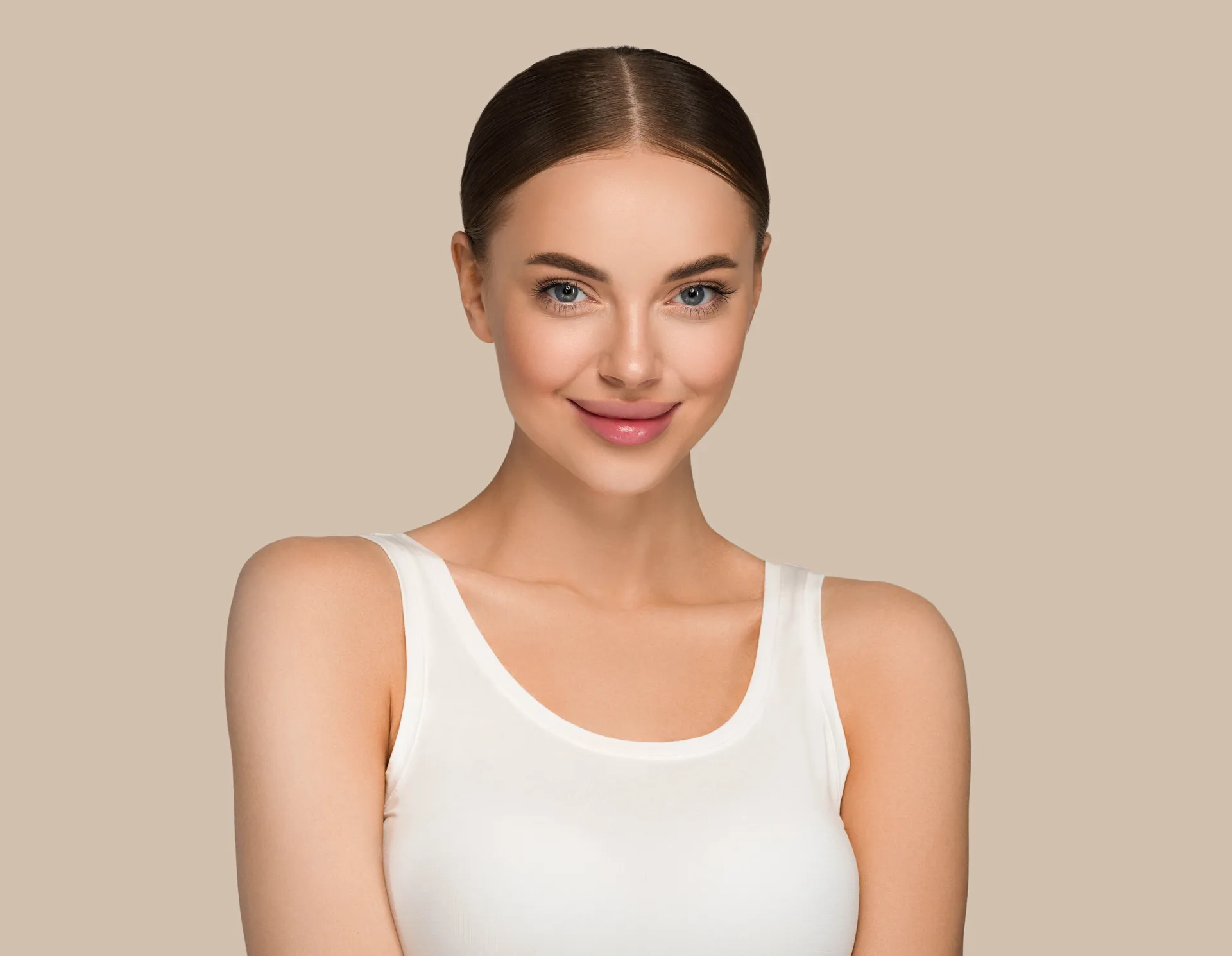 A woman with clear, healthy skin and natural makeup — the refined, natural results the Eikonha range is designed for.